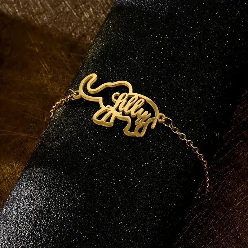 Stylish 18K Golden Plated Stainless Steel Bracelet featuring a Hollow Elephant design and customizable name. This Boho Style accessory is perfect for everyday wear and makes a great gift for special occasions like Christmas and Valentine's Day.