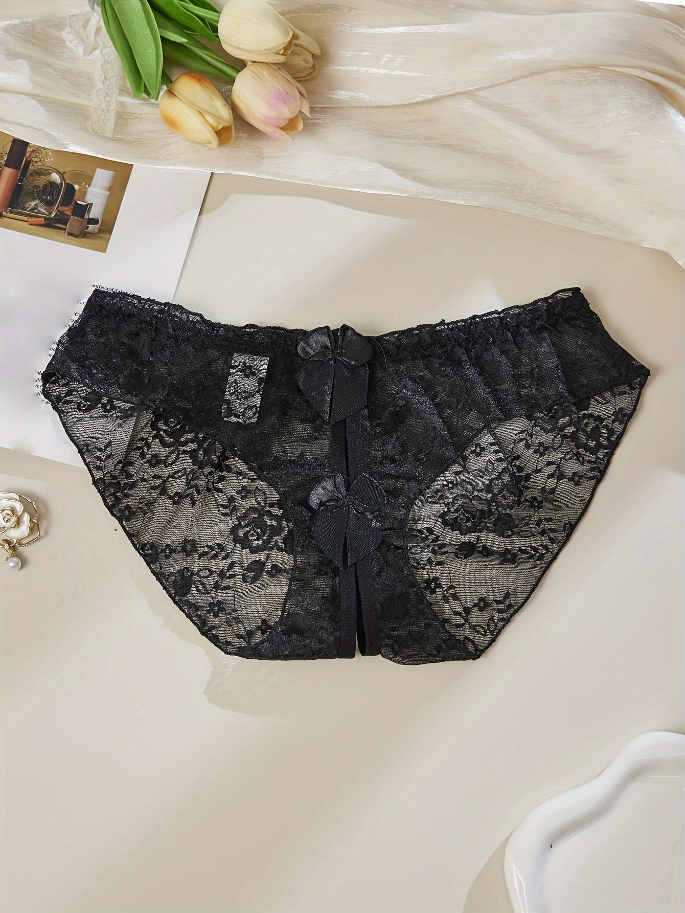 Sexy and alluring open-crotch women's underwear with bowknot lace, no need to remove for a super sexy night look.