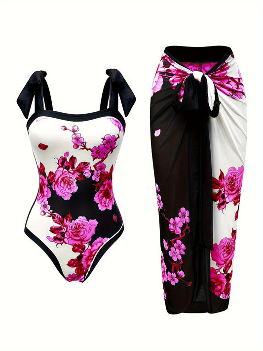 Stylish one-piece swimsuit with sun protection, floral print, and sheer skirt - ideal for the beach.