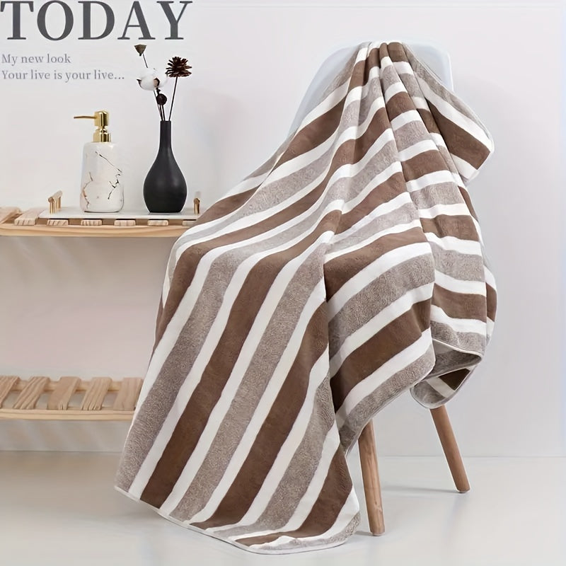 Large, soft, and super absorbent bath towel with modern striped blend design in a space theme. Made from knit fabric and quick-drying, weighing 280gsm. Ideal for adults.