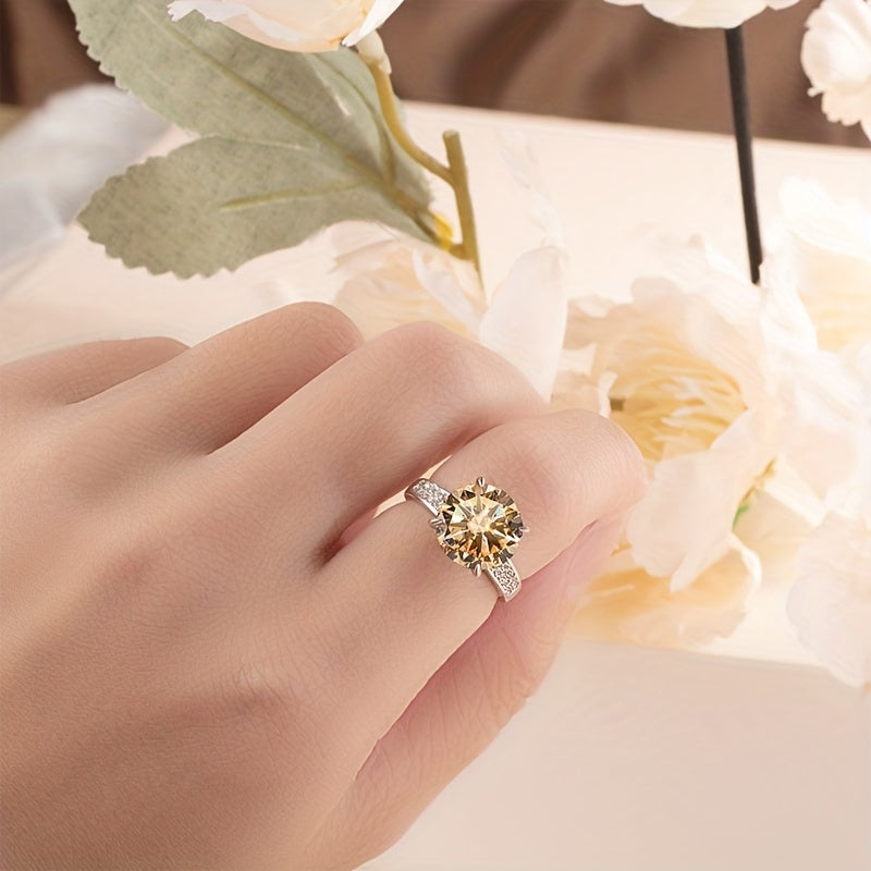 A stunning 5ct Moissanite ring crafted in 925 Sterling Silver, available in multiple colors. This high-quality jewelry piece is perfect for engagement and wedding scenes. Comes with a certificate of authenticity and gift box.