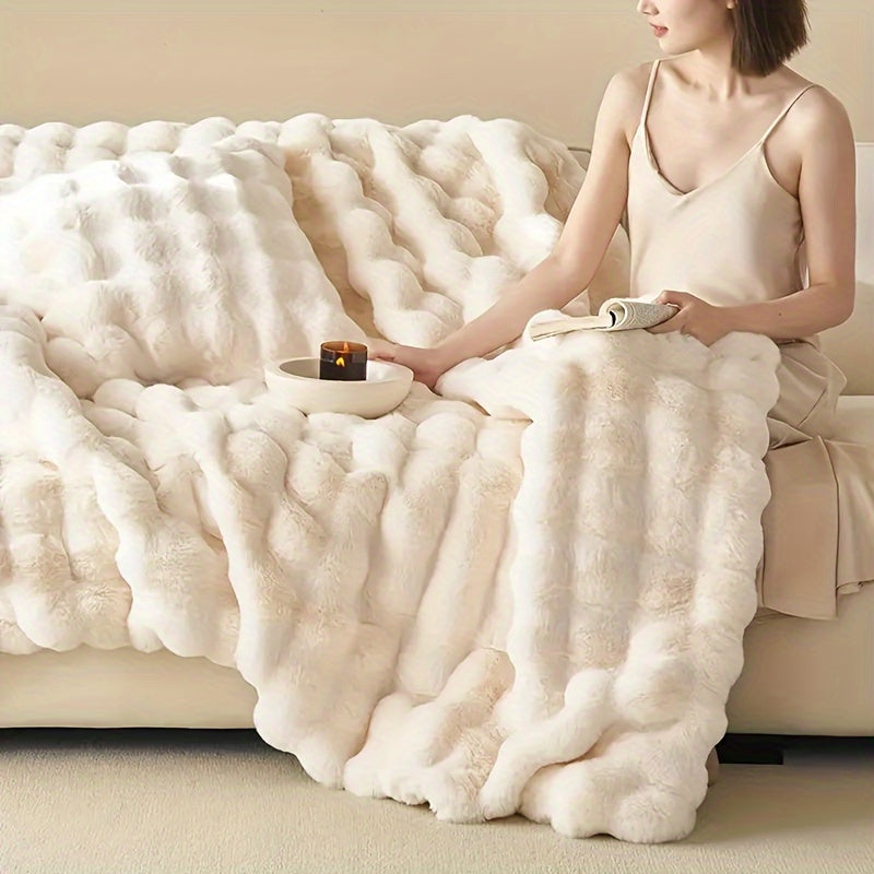 Get cozy with this versatile 1pc Double-sided Rabbit Fleece Blanket. Made with soft faux fur plush material, this solid color blanket is perfect for keeping warm on the couch, sofa, office, bed, camping, or travel. It also makes a great multi-purpose