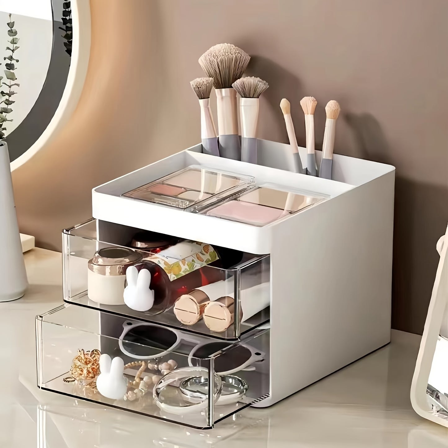 Chic white cosmetic storage box with rabbit handles, 2-drawer desktop organizer for makeup, jewelry, and office supplies. Transparent compartments, lightweight, and easy to assemble. Ideal gift for women.