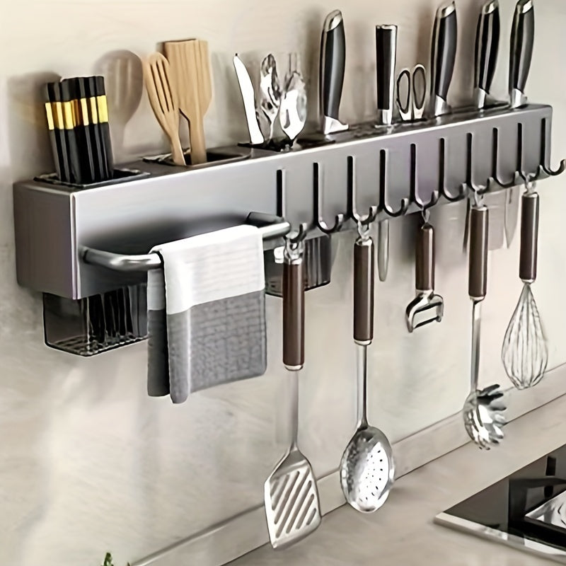 Wall-mounted carbon steel kitchen organizer featuring a no-drill design. This multi-functional rack is perfect for storing knives, forks, spoons, and chopsticks, with added features such as drainage and a towel holder.