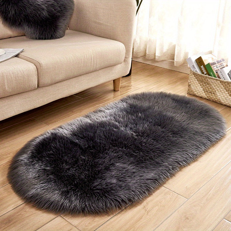 One piece of a luxurious Super Soft Area Rug, featuring a Plush Fluffy Faux Sheepskin design in an Oval shape, perfect for adding warmth to your Living Room or Bedroom. This Machine Washable Bedside Rug is made of Shaggy Plush Carpet Faux material, ideal