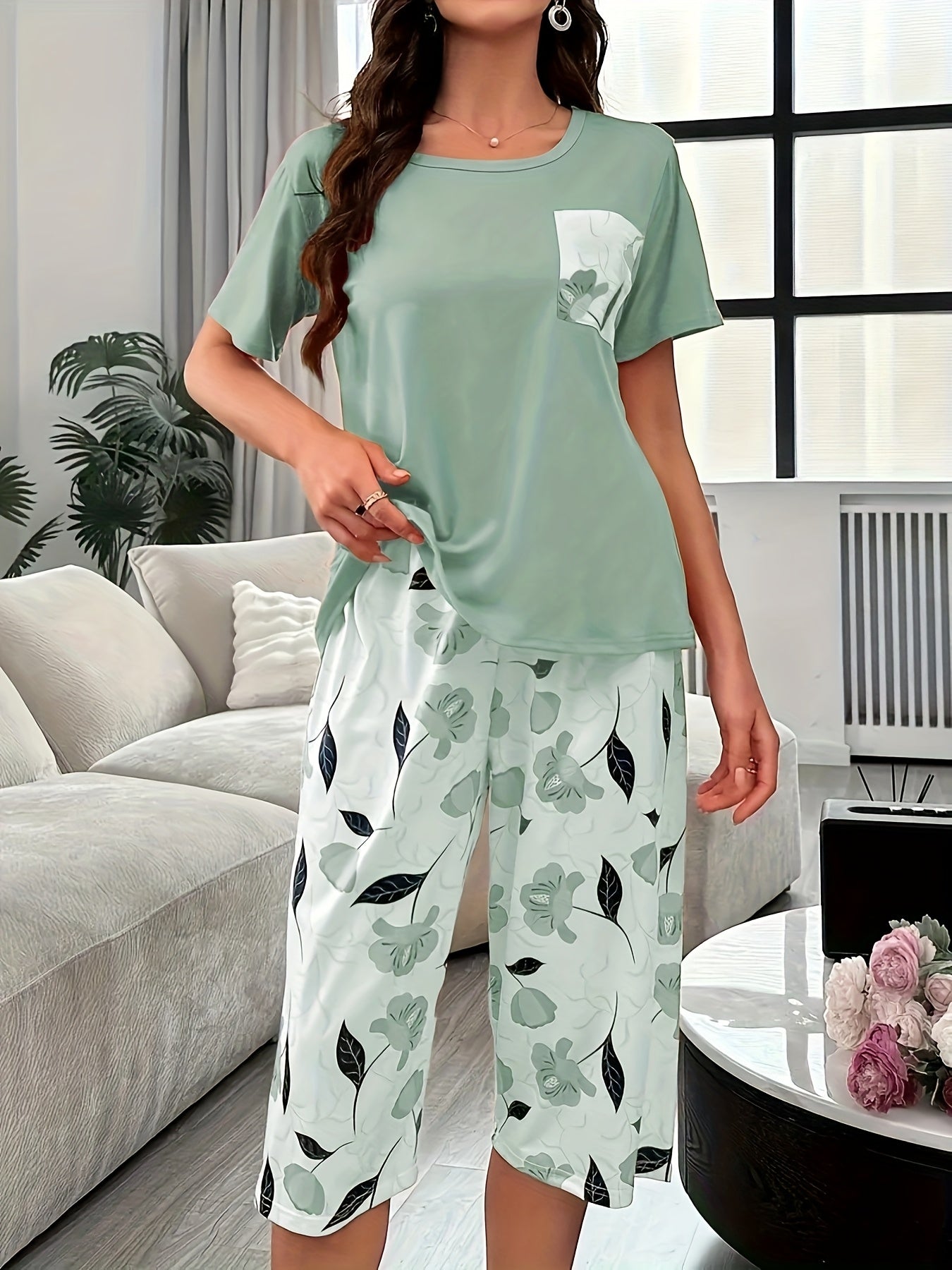 Trendy floral print three-quarter pants set for outdoor wear and loungewear for plus size women.