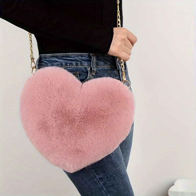 Heart-shaped fluffy shoulder bag with faux fur and zipper. Perfect gift for Valentine's Day, outings, and daily use.