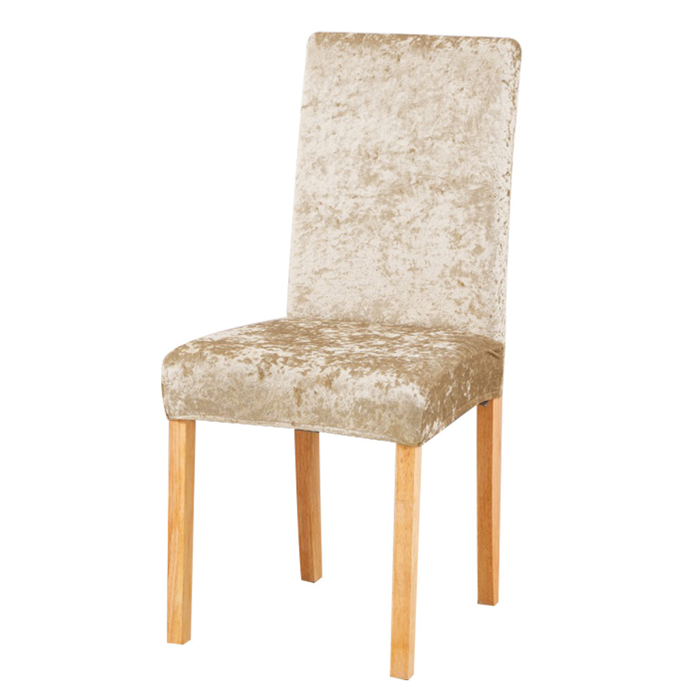 Velvet dining chair slipcovers add elegance while protecting furniture.