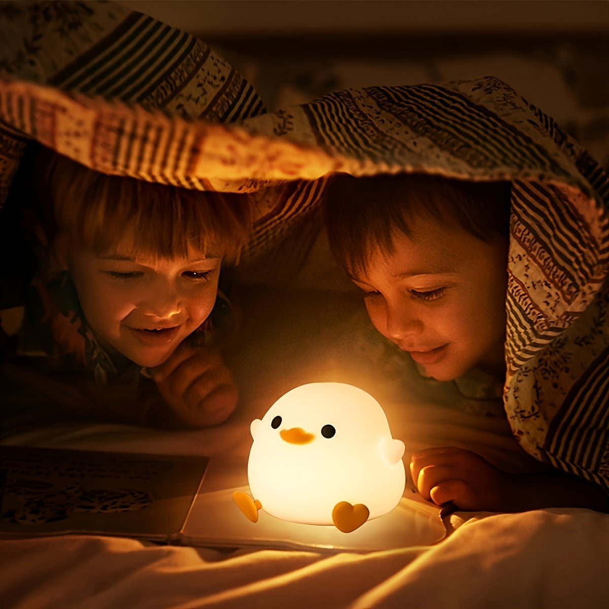 Duck-shaped silicone night light and pat lamp: Soft, eye-safe USB rechargeable bedside light for cozy room decor.