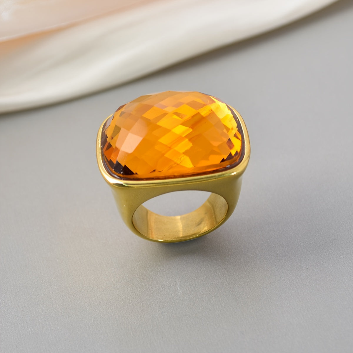 Elevate Your Look with our 1PC Hip Hop Luxury Style Square Gemstone Ring! This elegant statement ring features a large stone and is perfect for daily wear or special occasions. Made with 18K plated zirconia inlay and stainless steel band, this Mardi Gras