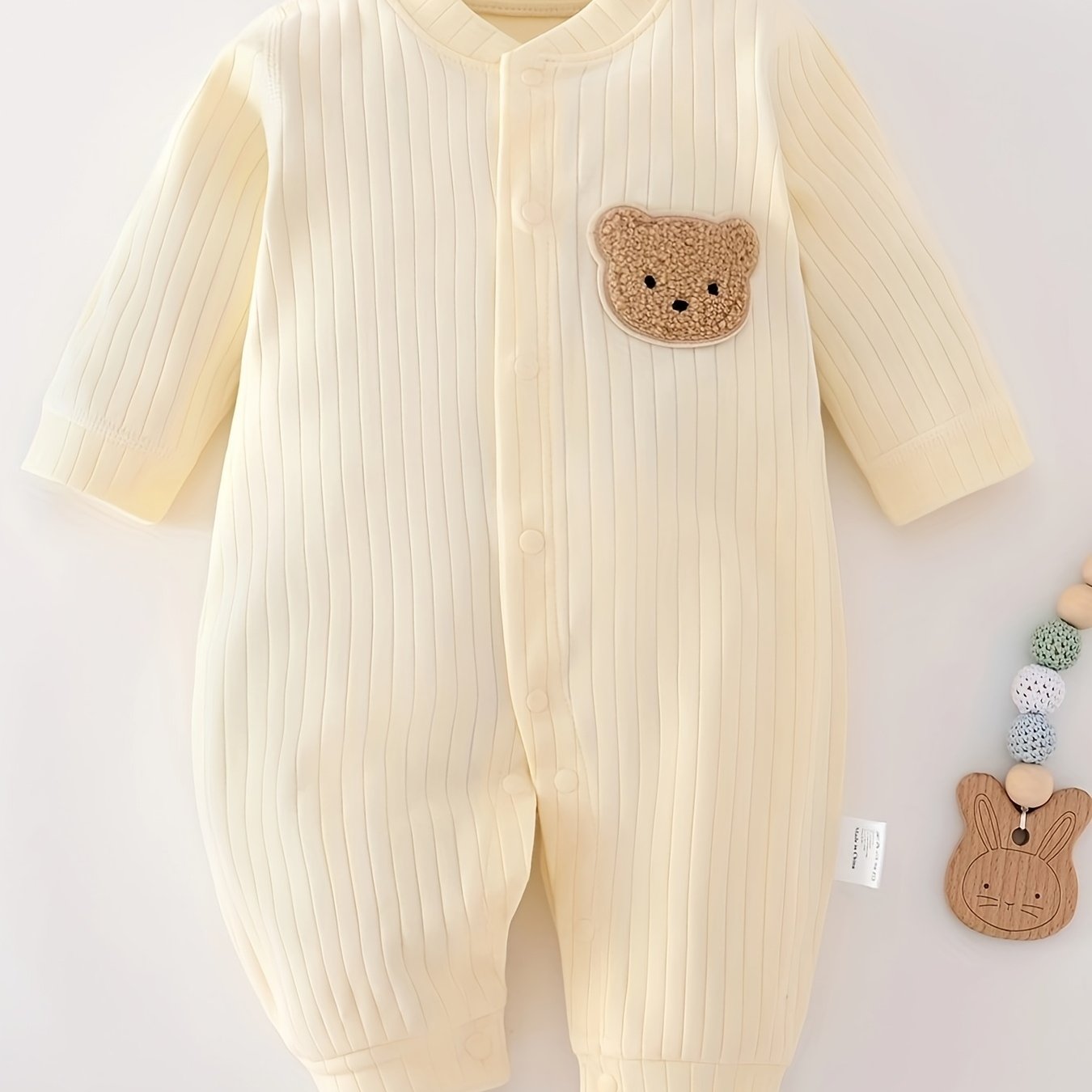 Cute Teddy Bear Cotton Romper with long sleeves and front button closure, suitable for all seasons, ideal for outdoor wear.