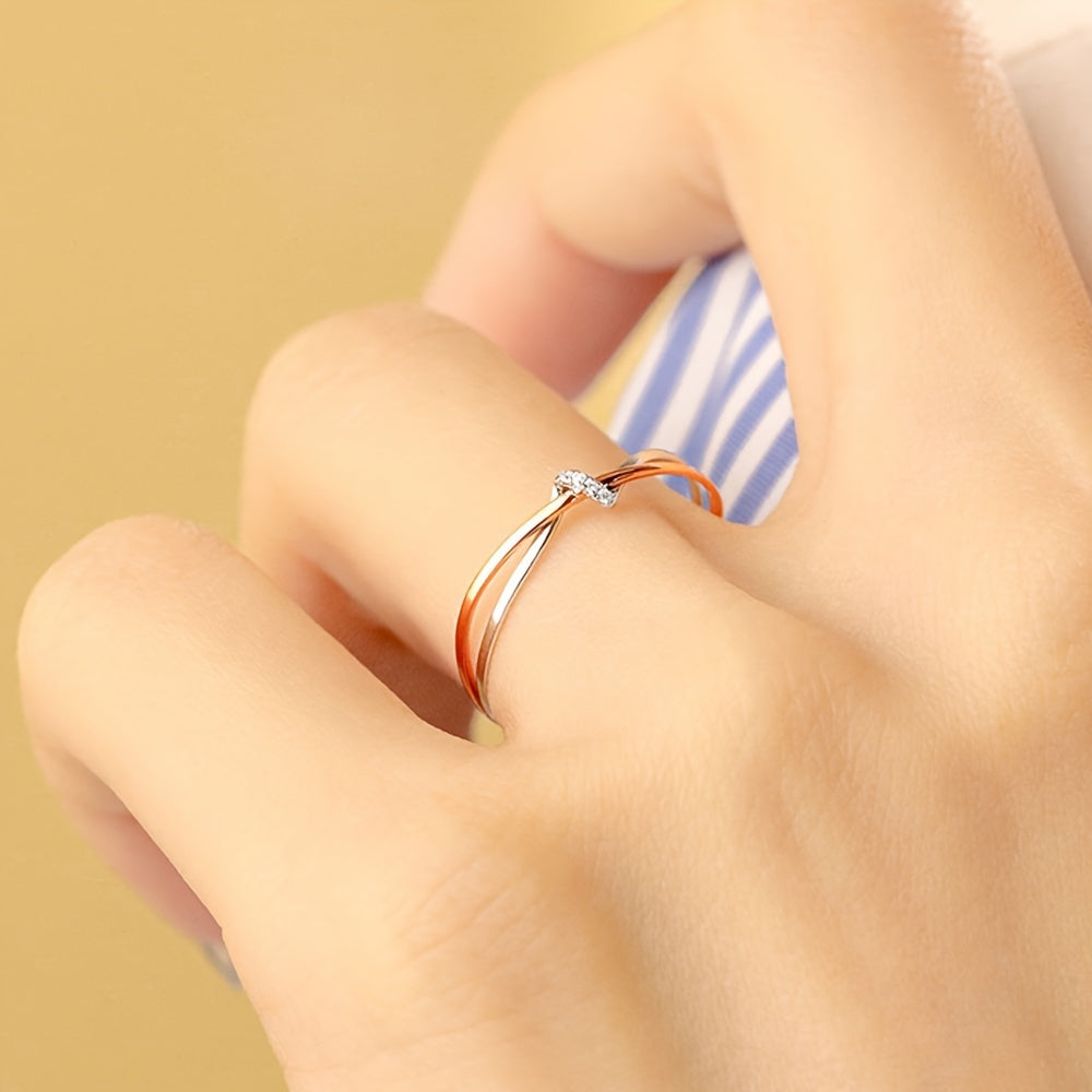 Rose Gold Double Knot Ring - This exquisite ring features elegant rose gold intertwined in a double knot design, crafted with 925 sterling silver and embellished with sparkling cubic zirconia stones. Perfect for celebrating your anniversary, this 2.0g