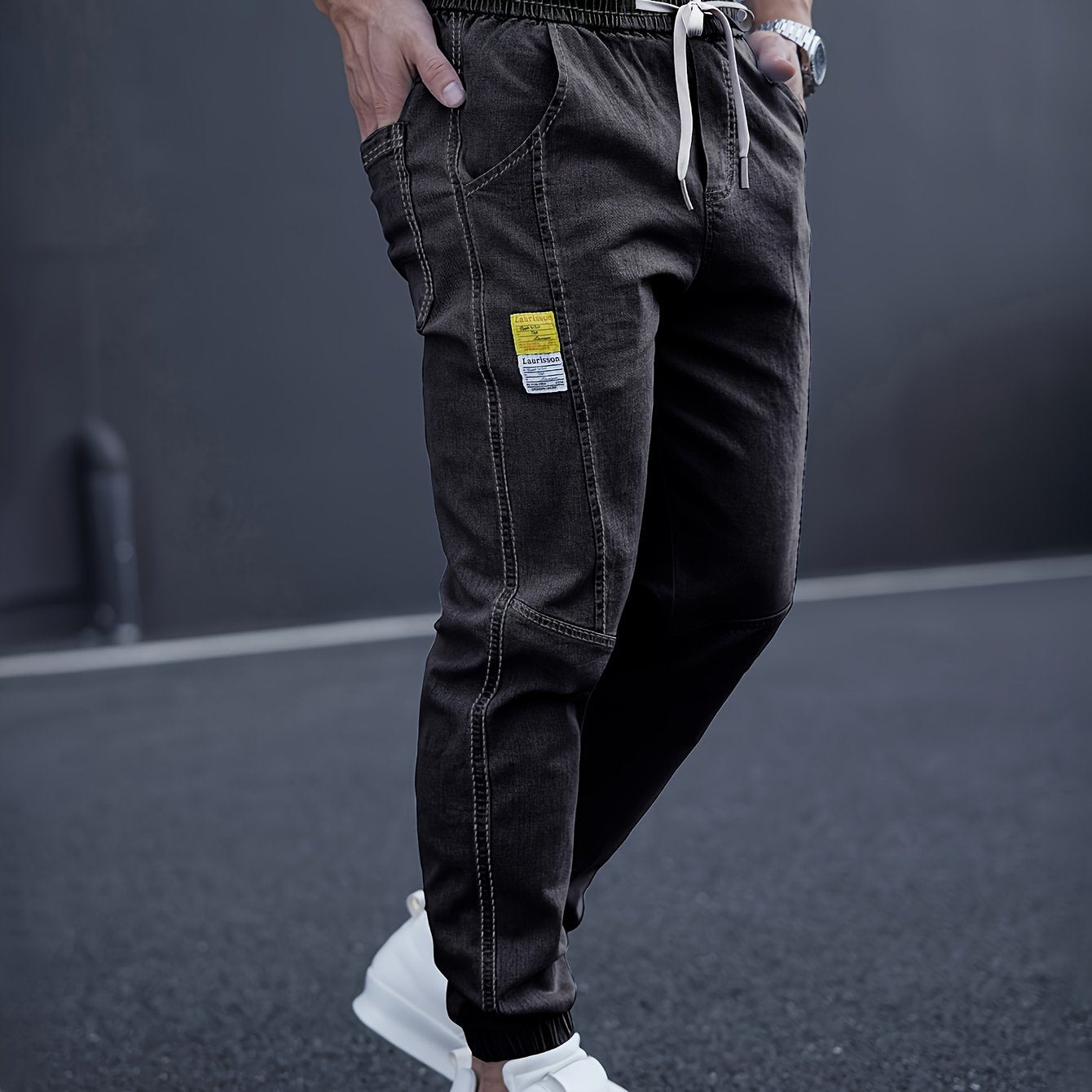 Trendy men's tapered jeans with waist drawstring