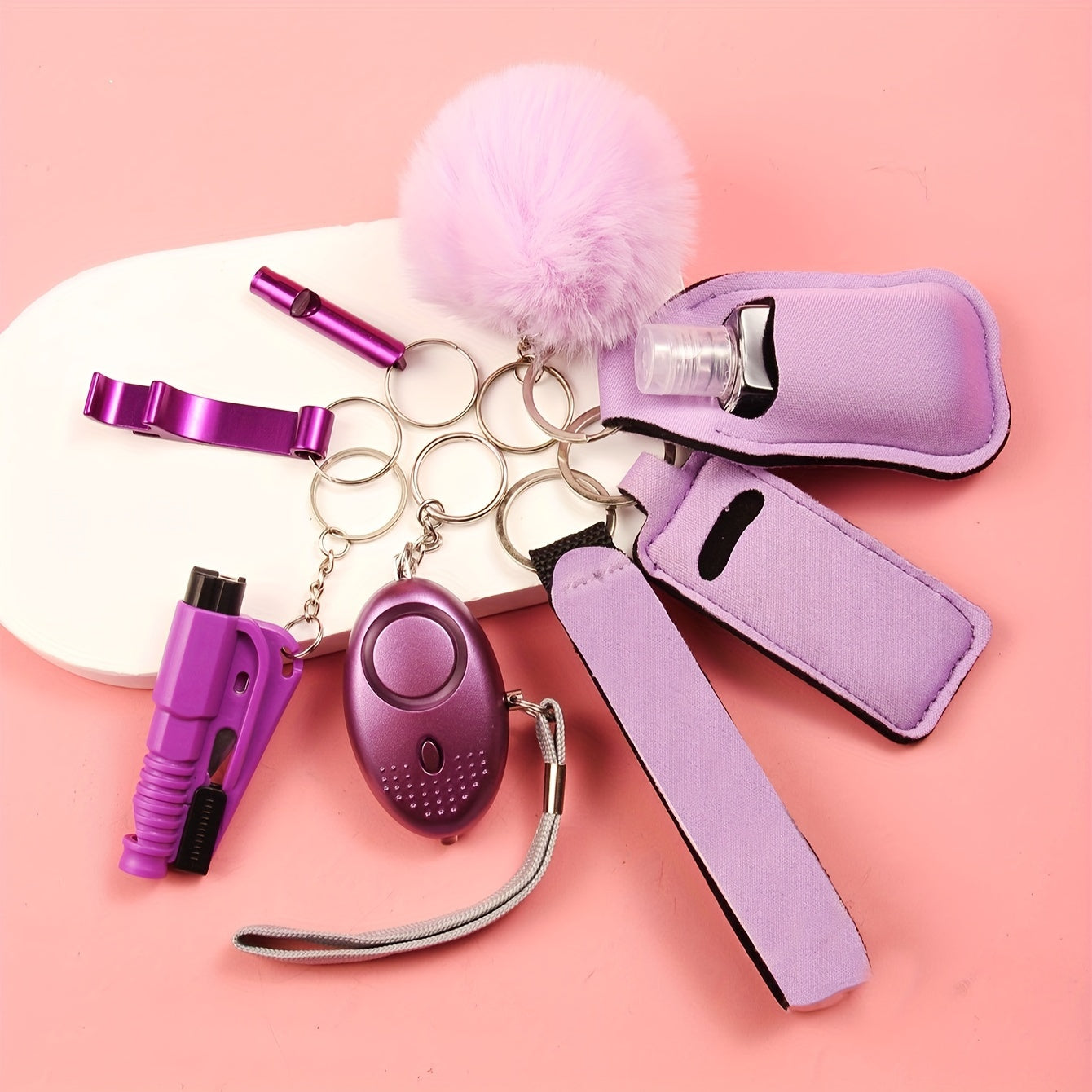 Set of 8 pieces including a personal alarm, mini window breaker, and survival whistle. Made of durable zinc alloy in a cute style designed for men.