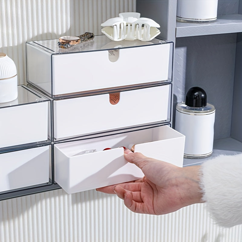 Cosmetics storage box with drawers, stackable design for bathroom and bedroom organization.