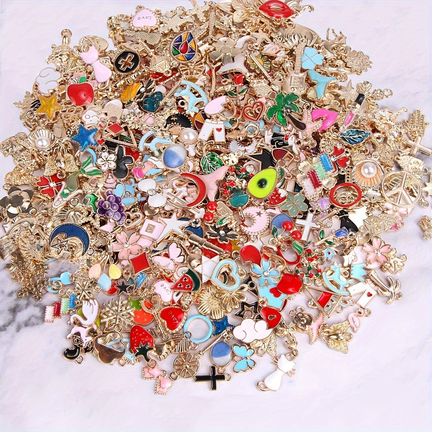 50 pieces of assorted golden enamel plated charms made of zinc alloy, perfect for DIY jewelry making to create pendants for necklaces, bracelets, earrings, and fabric accessories. Craft supplies included.