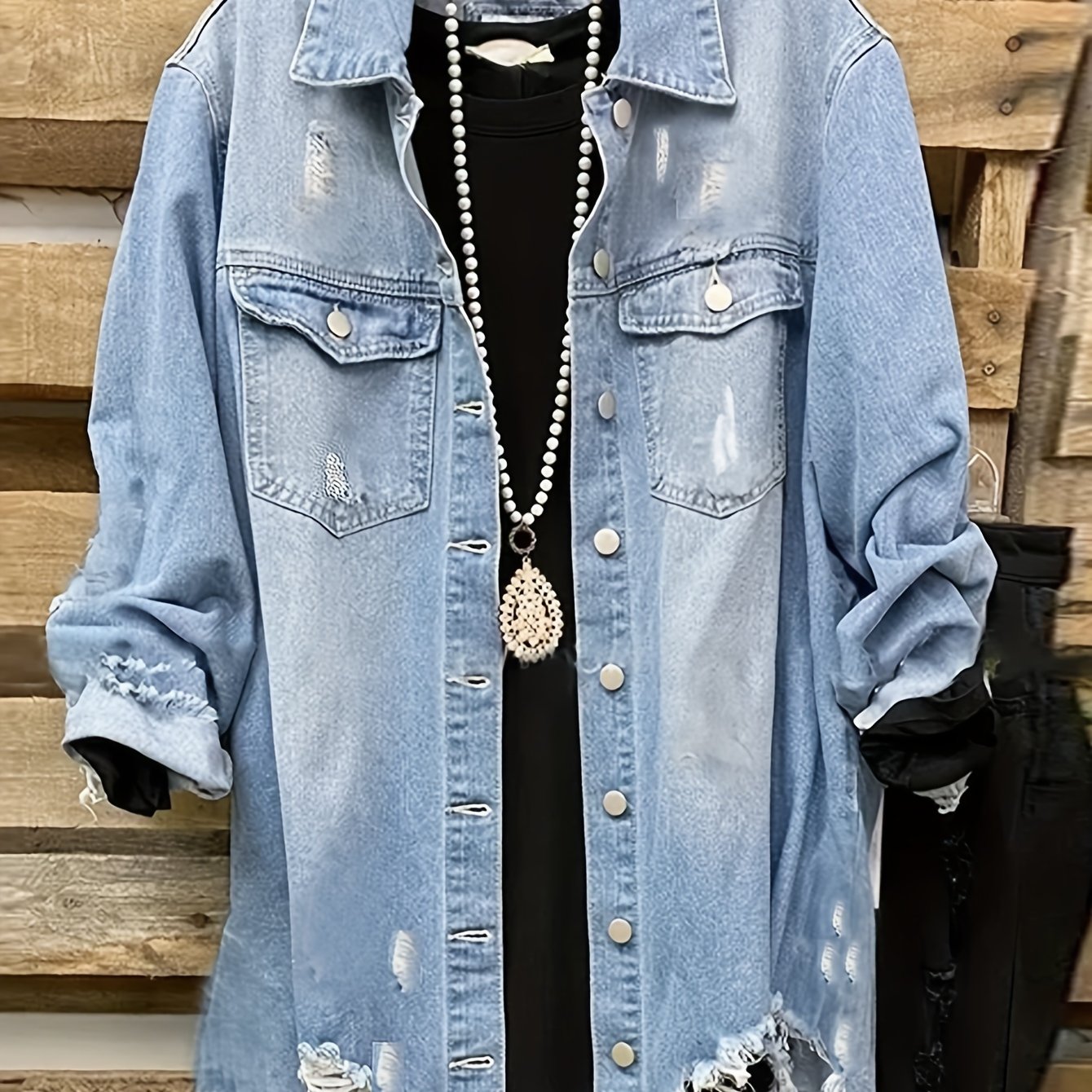 Women's oversized denim jacket with asymmetrical hem, lapel collar, and raw hem detail. Made from non-stretch 100% fabric, suitable for all seasons.