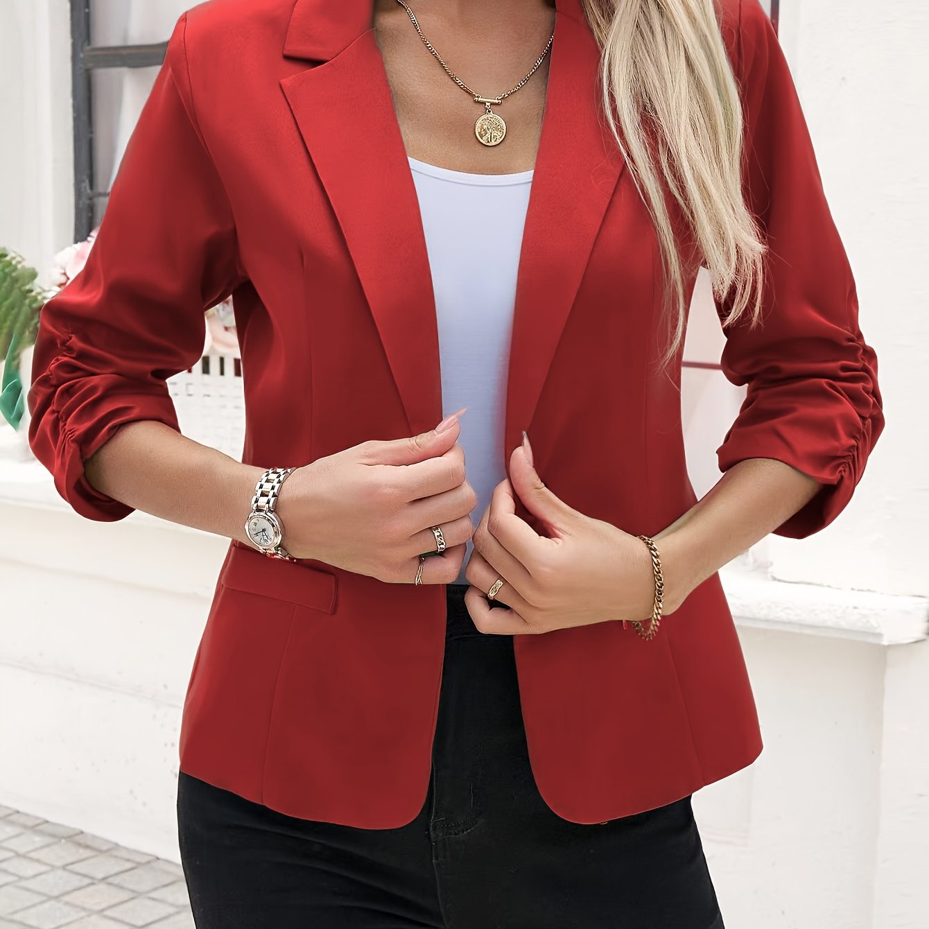 Women's slim-fit casual blazer with a single button placket, roll-up sleeves, and polyester lining for spring/fall season.