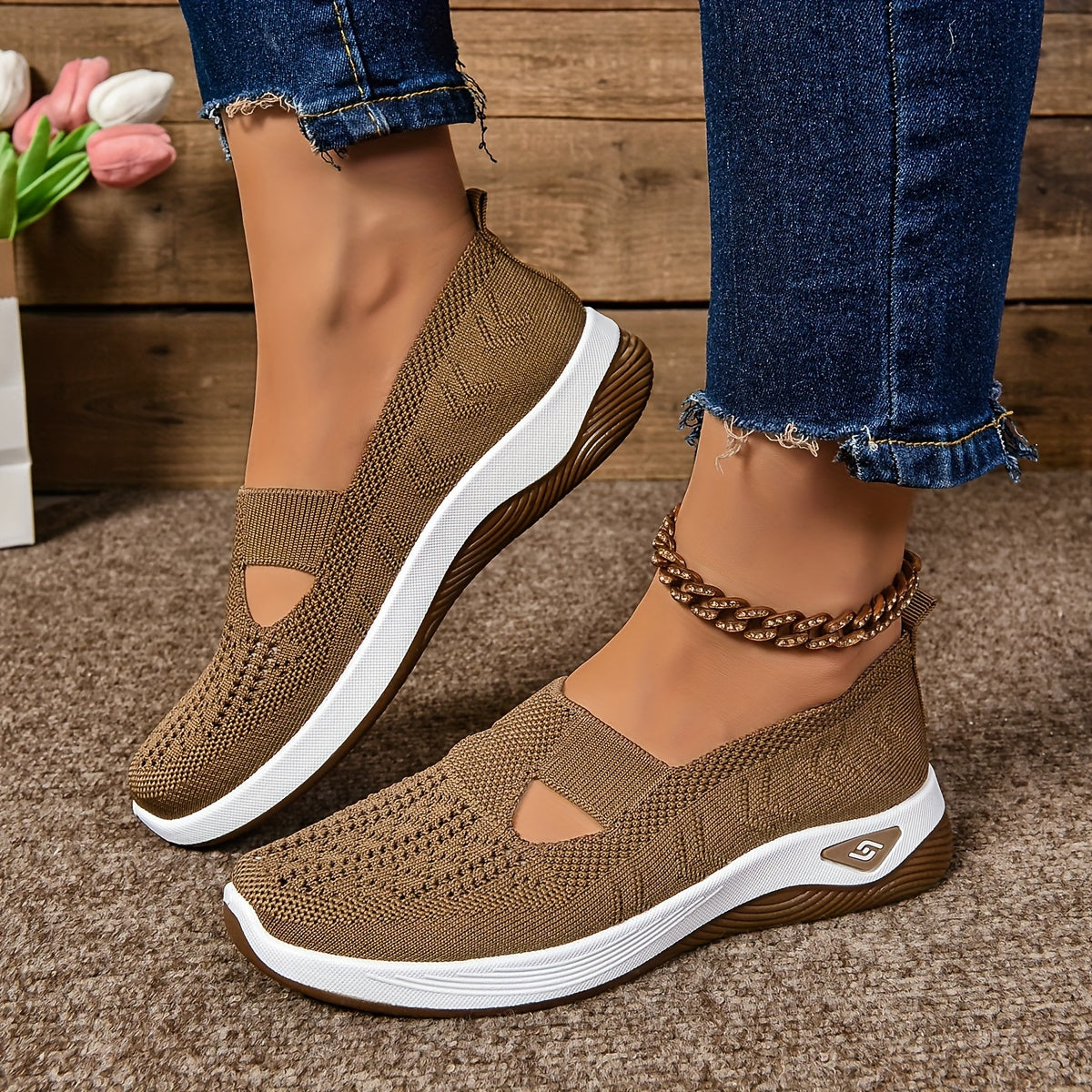 Women's slip-on sneakers in various colors with breathable fabric, EVA sole, and low-top design for all-season comfort.