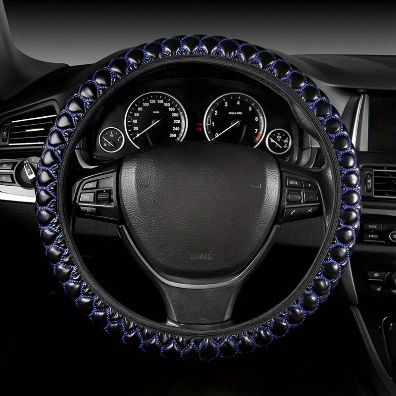 Luxurious embroidered faux leather steering wheel covers with anti-slip grip, universal fit. Comfortable and durable accessory for your vehicle.