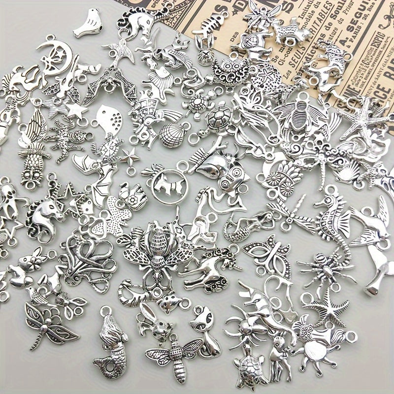 100 pieces of metal mixed jewelry making charms, vintage animal charms for DIY necklace making.