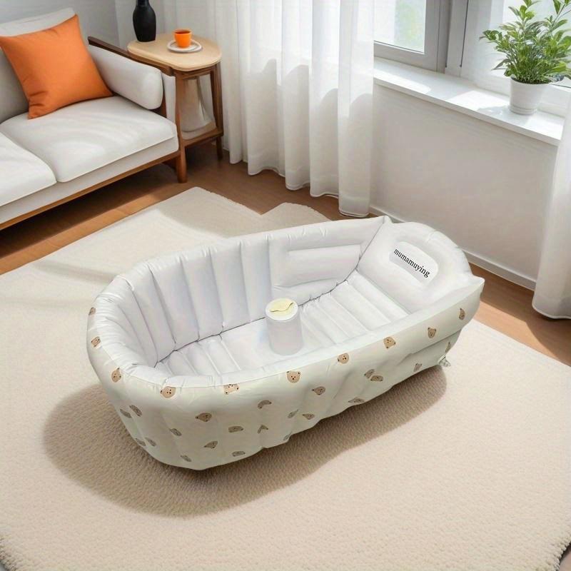 Soft and foldable portable inflatable bathtub featuring a cute cartoon design. Perfect for travel and home use, ideal for caring for youngsters.