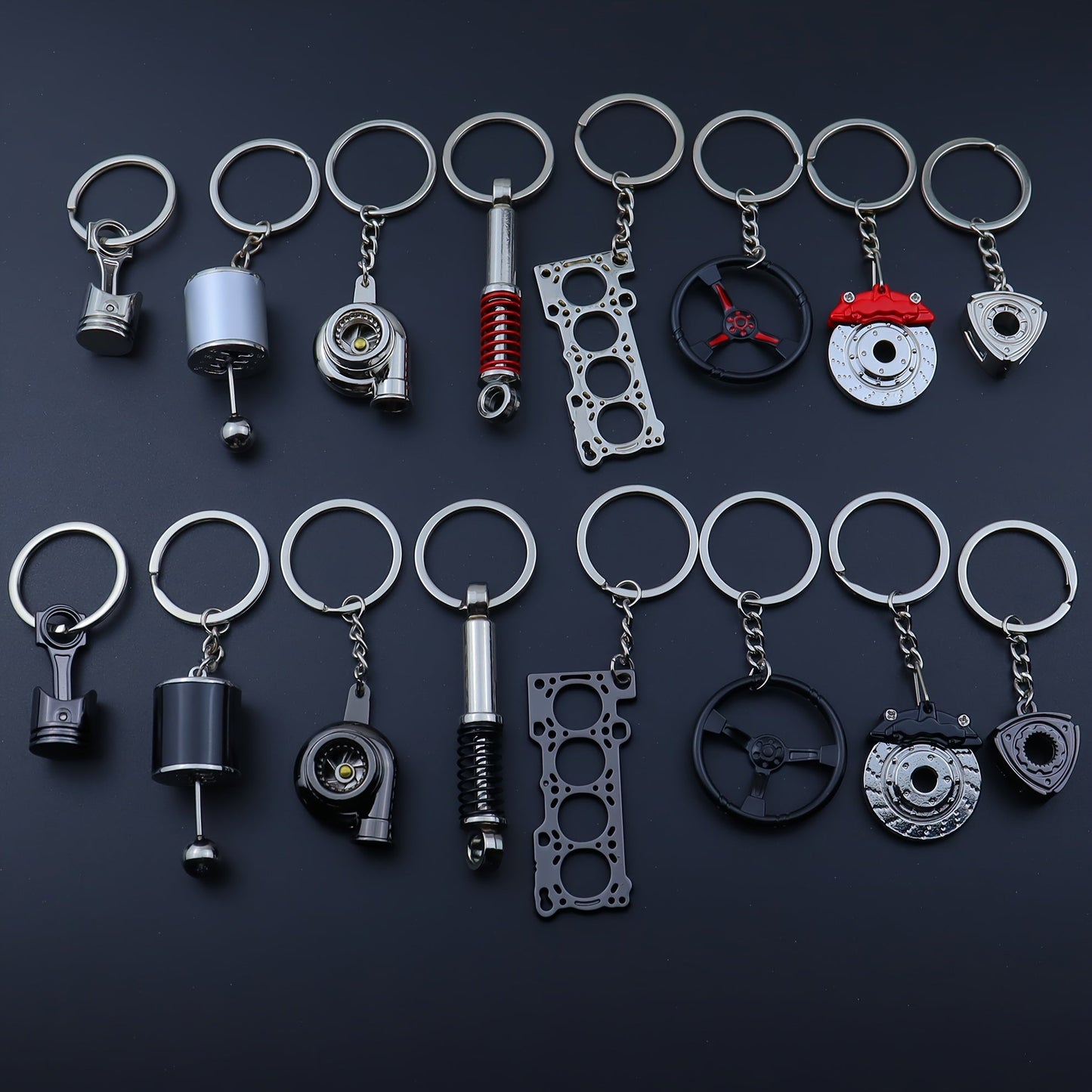 Keychains for creative car modifications, including piston, brake disc, gear, turbocharger, small rotor, shock absorber, engine blade, and steering wheel designs. Perfect for car enthusiasts and as a unique gift.