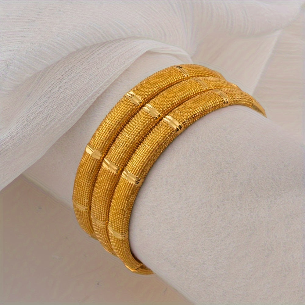 Stylish and sophisticated, this 4-piece gold-toned copper cuff bracelet set is perfect for women. These open bangle bracelets are classic and versatile, suitable for both daily wear and special occasions. They make a great gift for campus holidays and