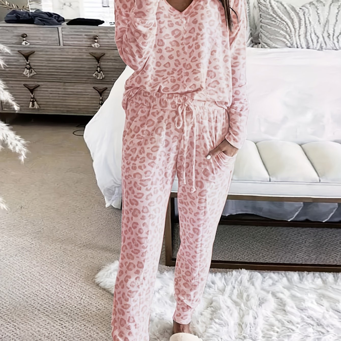 Leopard print lounge set with V-neck top and lace-up pants for women's loungewear and sleepwear.