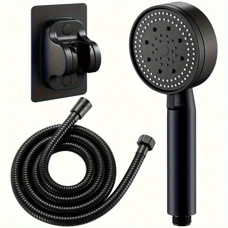 Handheld shower head with 5 adjustable modes. Wall-mounted round plastic design includes bracket, flexible hose. Modern shower accessory with space-saving plastic construction.