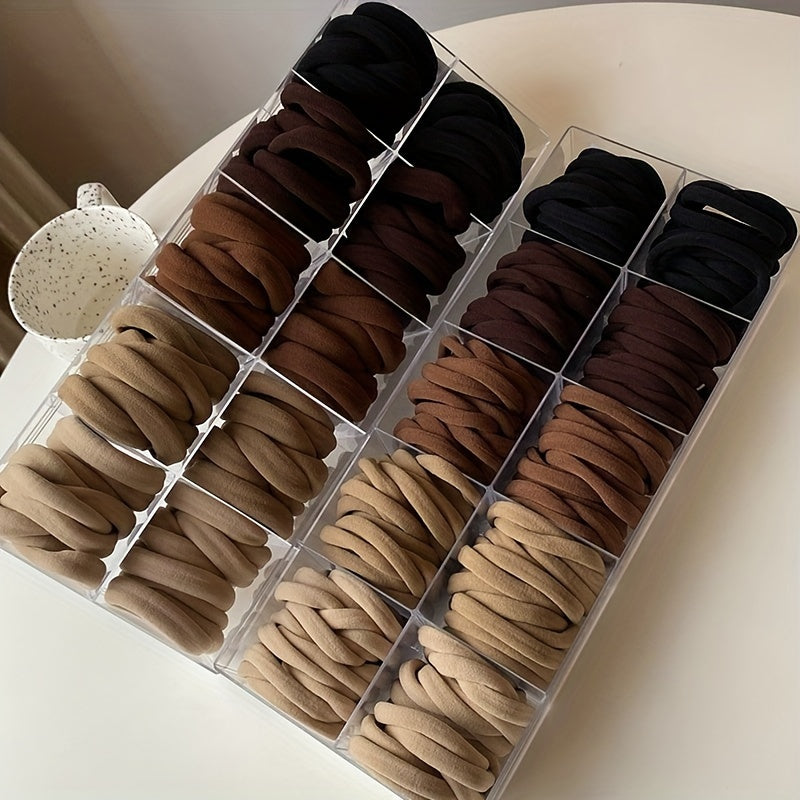 Solid color elastic hair rings in various quantities with anti-slip feature, suitable for daily use and holiday gifts.