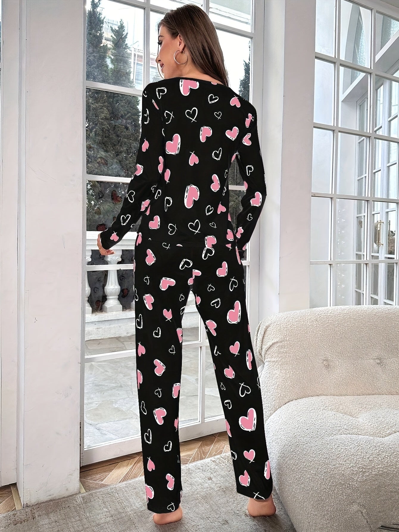 Heart print pajama set for women - cozy knit fabric with stretch - crew neck top and pants loungewear for all-season comfort.