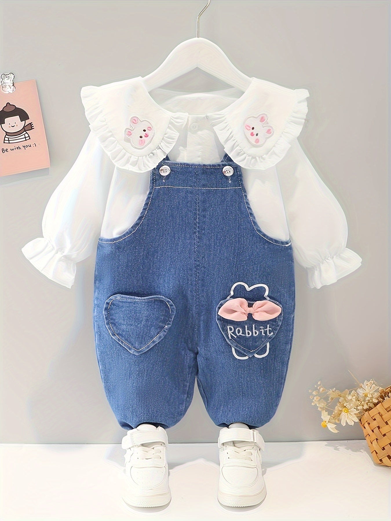 Baby girl's 2-piece denim overalls with rabbit embroidery plus ruffled blouse for spring and fall outdoor wear.