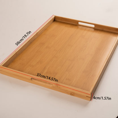 Bamboo serving tray with handles for eating, working, and storing in various locations.