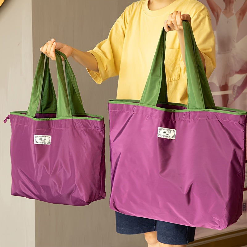 One-piece Large Drawstring Supermarket Shopping Bag with Multiple Options - a Fashionable Shoulder Bag that is Foldable, Compact, and Portable. Made of Waterproof Oxford Cloth, perfect for Grocery Shopping and stylish enough for everyday use.