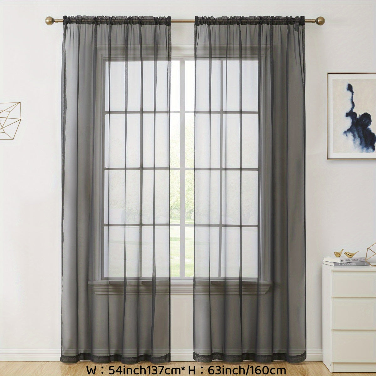 Enhance your decor with these elegant sheer voile curtain panels. Made of semi-transparent polyester, they feature a rod pocket design for easy hanging in your kitchen, bedroom, or living room. Create a romantic ambiance with these beautiful curtains.