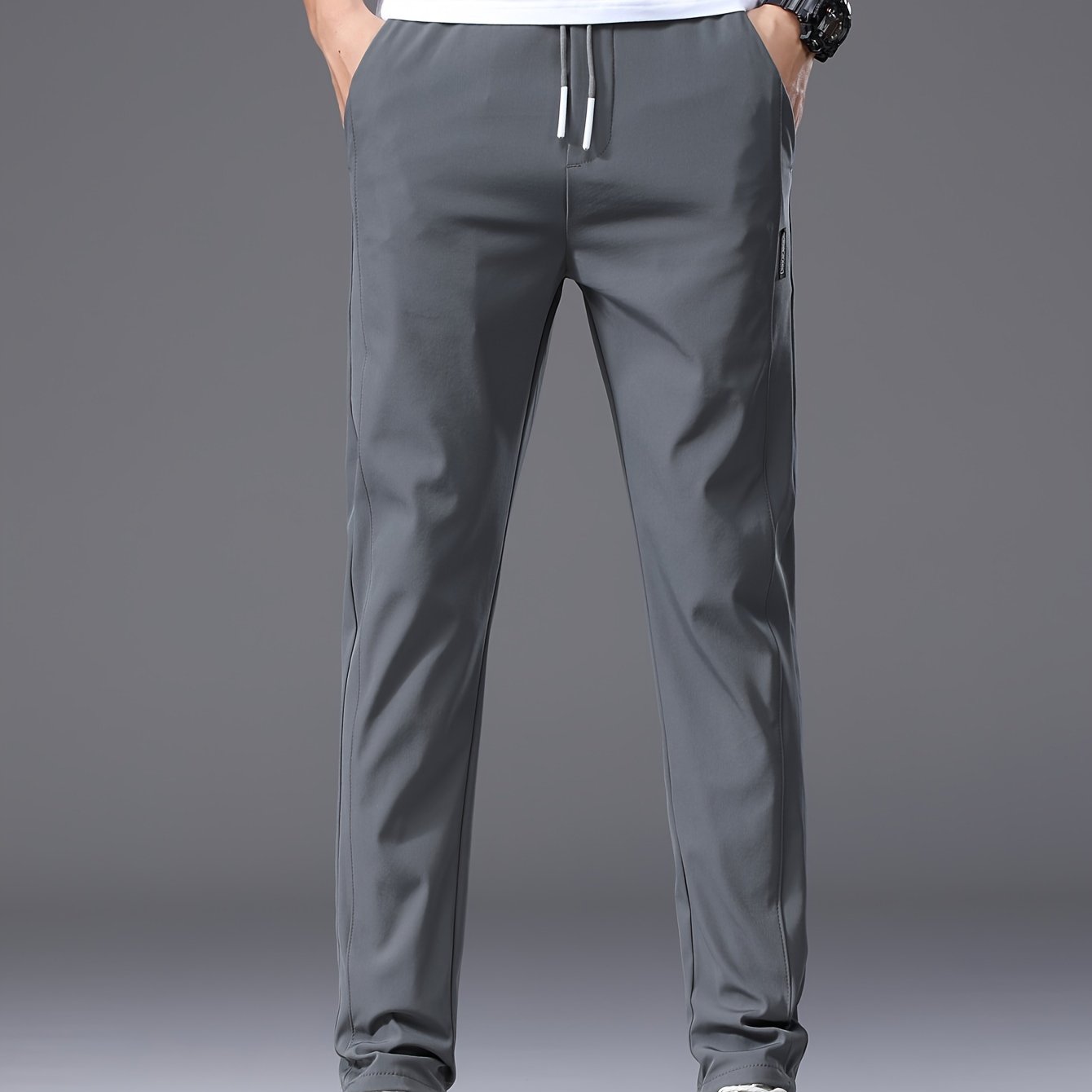 Men's slim fit drawstring sports pants, lightweight quick-dry trousers for summer leisure wear.