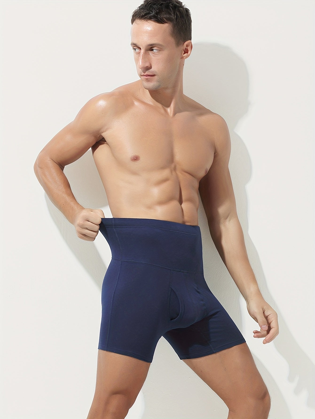 Men's super high-waisted long boxer briefs with front opening, extended leg length, and breathable, soft pure cotton material. Available in black, gray, and royal blue.