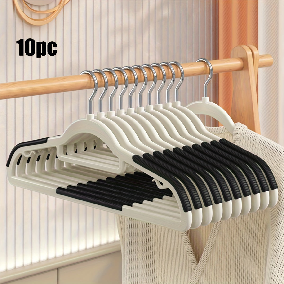 10 non-slip heavy duty clothes hangers for storage and organization in bedroom, bathroom, and home.