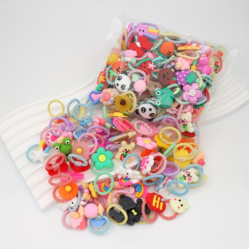 50 girl's hairbands with cartoon animals, flowers, and fruit, ideal for festive gifts.