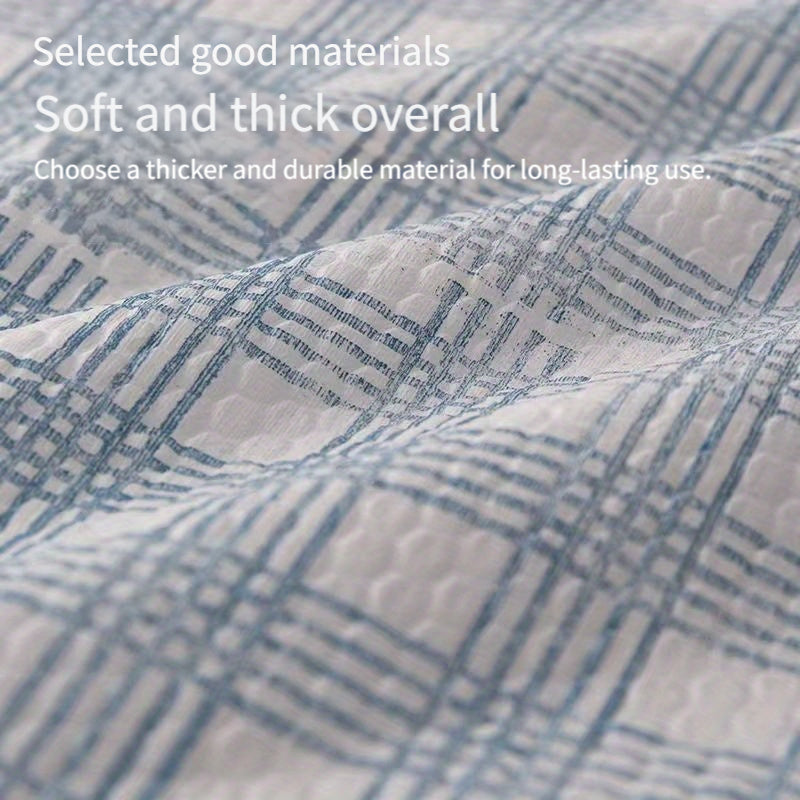 A pack of versatile blue plaid lazy rags for wet and dry use, perfect for cleaning kitchens. These high absorbency cloths are ideal for home and restaurant use as disposable dish towels or paper towels.