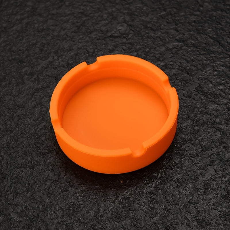 Round silicone ashtray for home or office use, suitable as a gift.