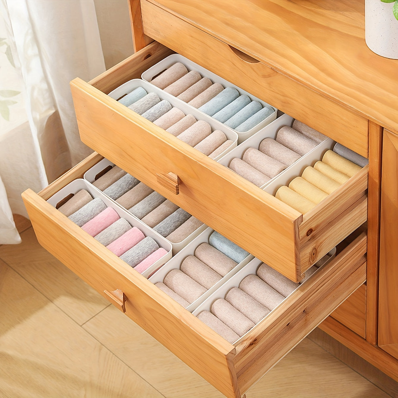 Pack of 10 plastic storage boxes for organizing underwear and socks, ideal for use in the home kitchen or closet. These durable drawer dividers are perfect for organizing clothes and accessories.