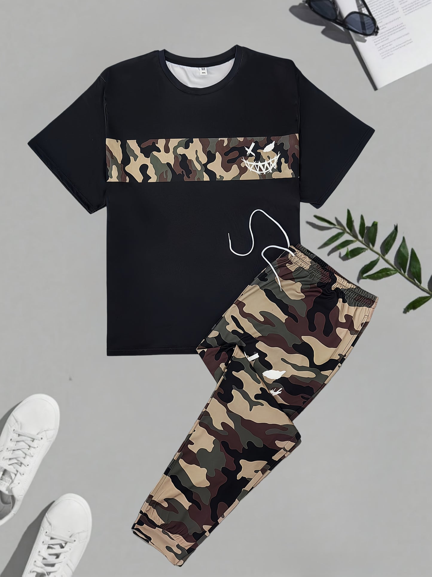 Men's plus-size camouflage set with short-sleeve top and long pants, perfect for outdoor activities. Features round neck, fitted design, and slightly stretchy fabric.