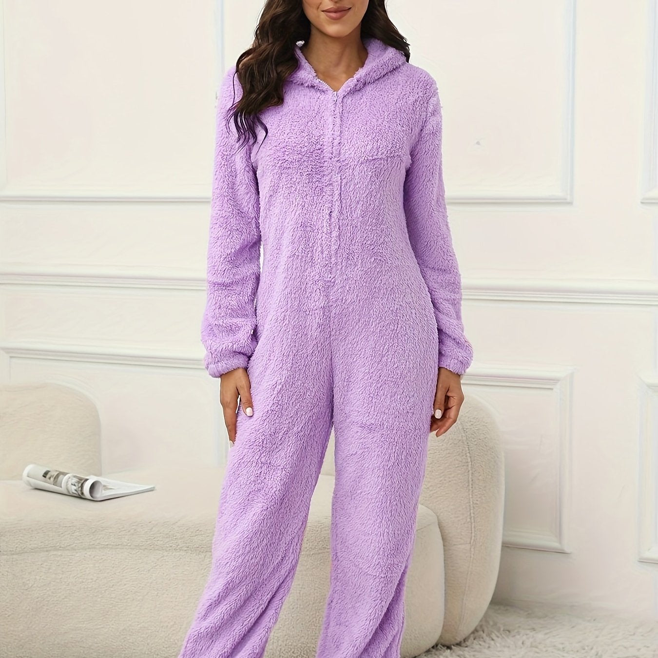 Hooded lounge jumpsuit with fuzzy fabric, zippered front, perfect for women's loungewear and sleepwear.