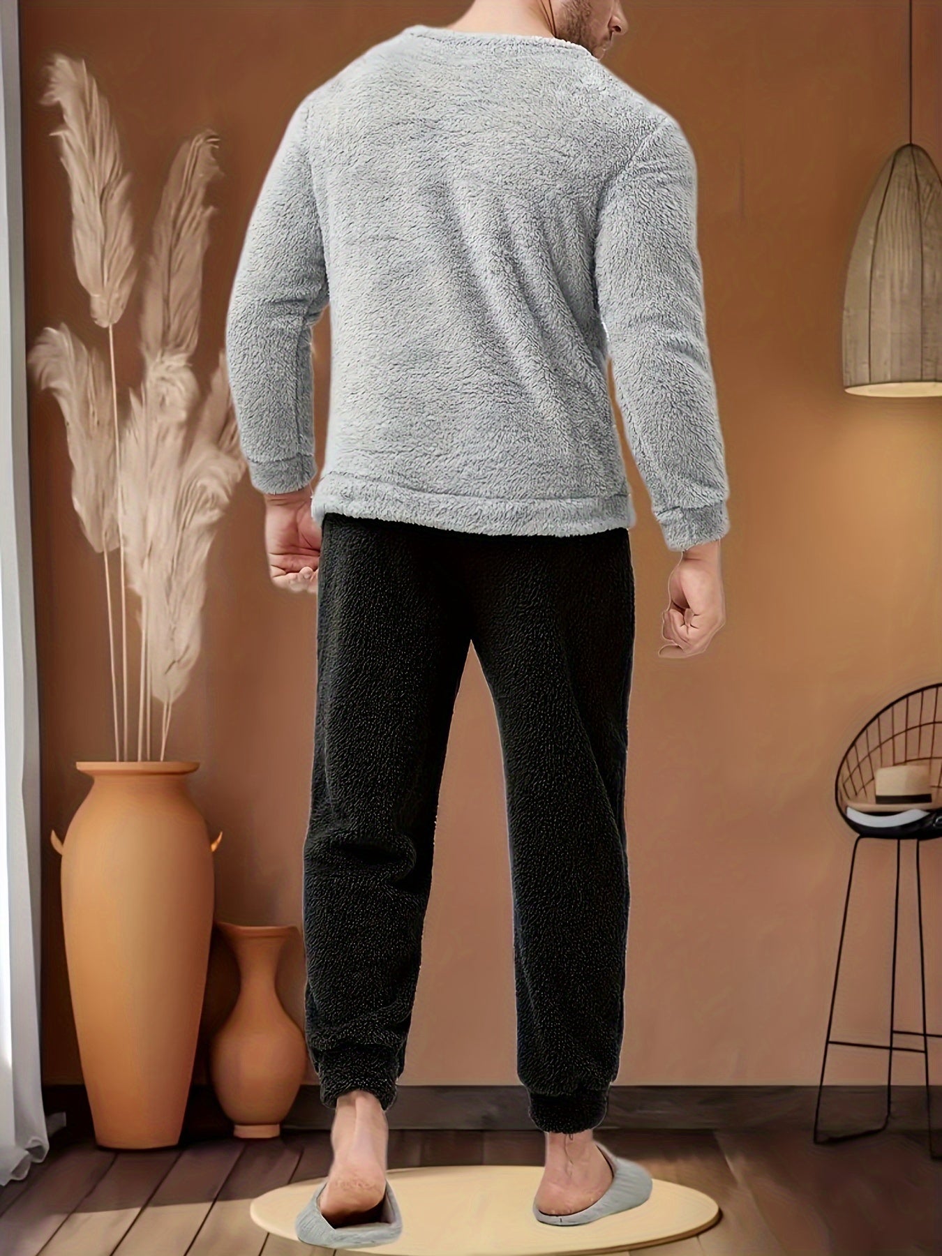 Men's cozy winter flannel pajama set with drawstring, loose fit, and round neck. Made from polyester knit fabric for casual home wear.