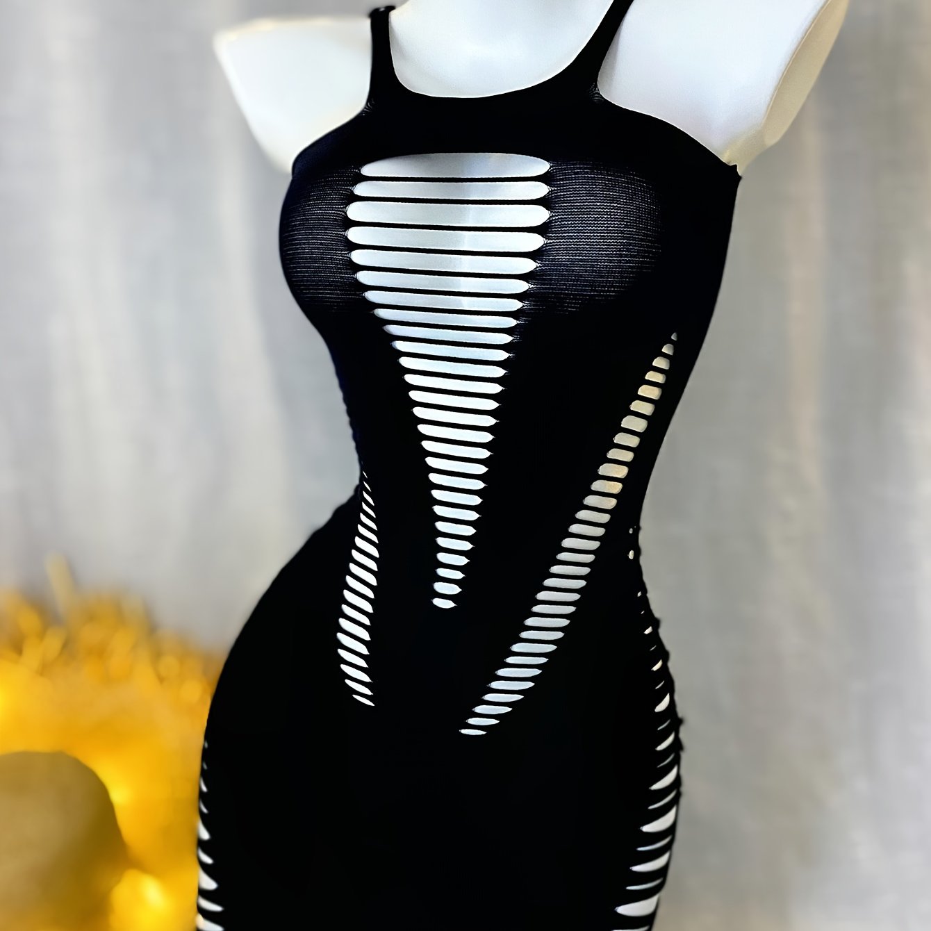 Sexy Gu sleeveless bodycon dress, ideal for music festivals or vacations. High stretch knit fabric with hollow out design and solid color polyamide cover up. Perfect beachwear swimsuit for