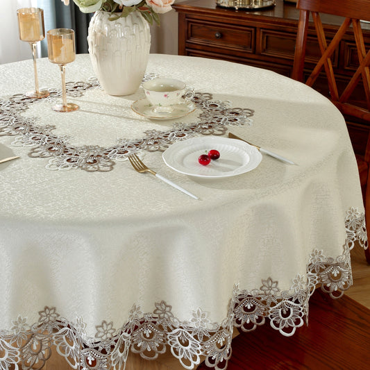 Polyester round tablecloth with lace border, ideal for various occasions in multiple sizes.