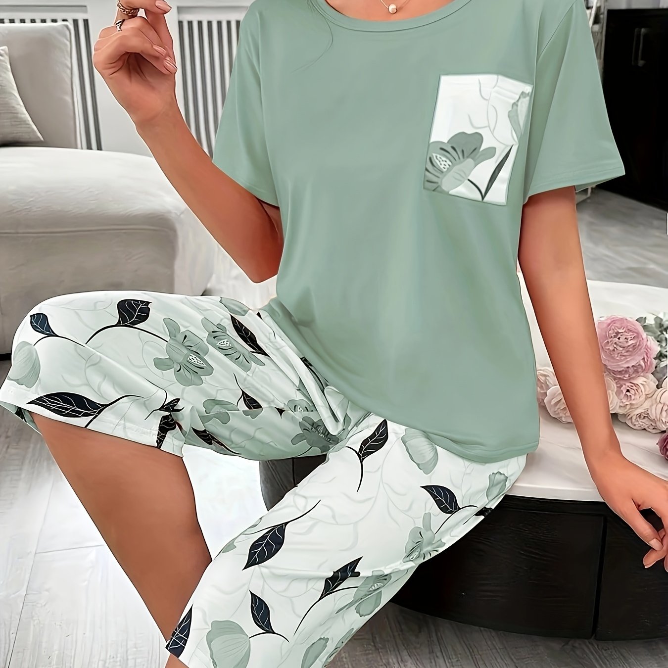 Trendy floral print three-quarter pants set for outdoor wear and loungewear for plus size women.