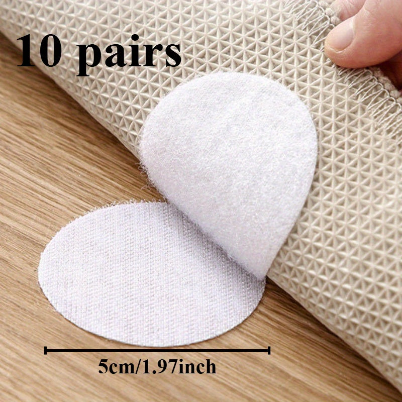 10 sets of transparent sofa cushion adhesive strips with white anti-slip backing. They are spot-clean and non-marking, suitable for fastening bed sheets and carpets in various scenarios.